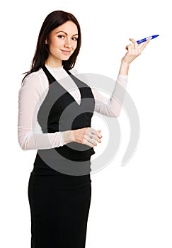 Cute businesswoman pointing with a marker