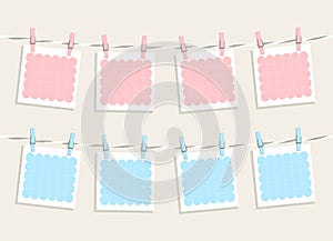 Cute cartoon blank paper templates hanging on a rope with clothes pins. Baby shower