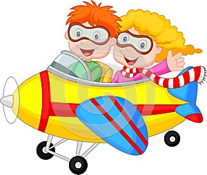 Cute cartoon boy and girl on a plane photo