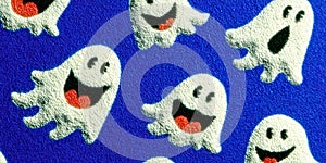 Cute cartoon ghost pattern on blue background