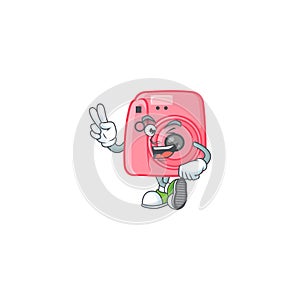 Cute cartoon mascot picture of instan camera with two fingers