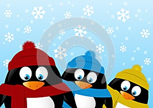 Cute cartoon penguins on winter background