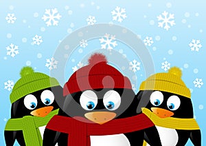 Cute cartoon penguins on winter background