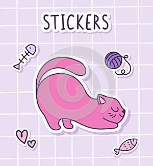 The cute cat is stretching. Sticker of a pink cat with toys on a checkered background. Label Sticker.