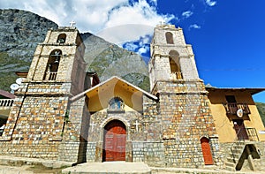 Cute catholic church in rural village of Huancaya, Peru photo