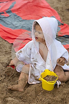 Girl. Beach. Toys. Summer. Sand. Towel. Cute