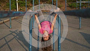 Cute Caucasian little happy girl on playground