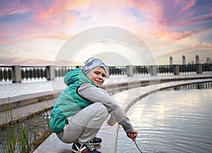 Cute Caucasian teenager boy smiling looking at the camera,