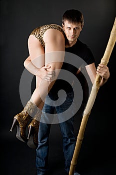 Cute caveman with a club and a girl