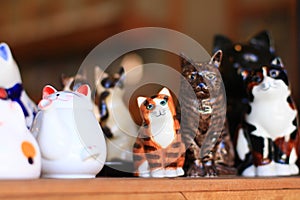 Cute Ceramic cats on shelf