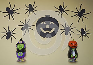 Cute characters in monster costume. Scary Halloween figurines stand on a light background close-up