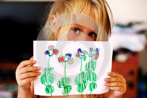 Cute cheerful child drawing