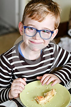 Cute child at breakfast