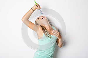 Cute child girl brushing teeth isolated on white background