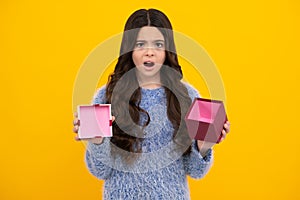 Cute child girl congratulate with valentines day, giving romantic gift box. Present, greeting and gifting concept