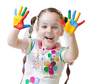 Cute child girl have fun painting her hands