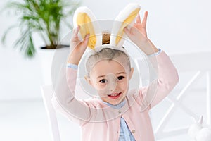 Cute child girl playing photo