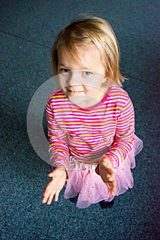 Cute child preschooler claping hands