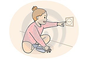 Cute child put finger in electrical socket