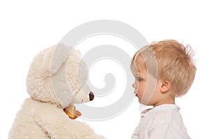 Cute child and teddy bear