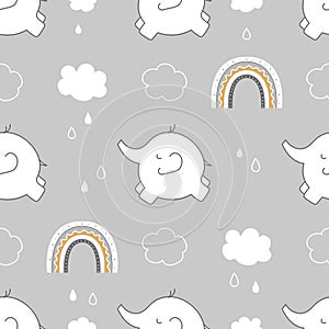 Cute childish seamless pattern with elephant, rainbow and clouds in the sky on gray background.