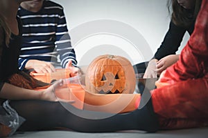 Cute children in costumes ready for trick-or-treating