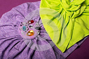 Cute children headband or turban on violet background