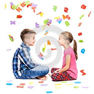 Cute children with large colorful alphabet letters on white background. Kids speech therapy concept. Speech impediment background.