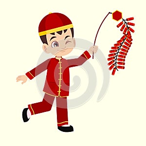 Cute Chinese Boy holding Chinese firecrackers