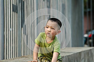 Cute Chinese boy playing