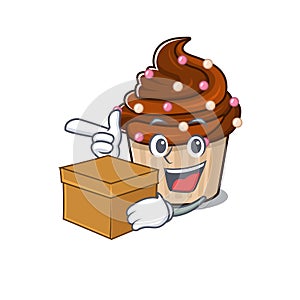 Cute chocolate cupcake cartoon character having a box