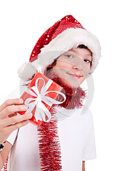 Cute christmas boy with a red gift