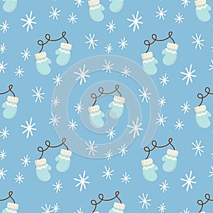 Cute Christmas seamless pattern with Christmas mittens and snowflakes. Hand drawn Vector illustration