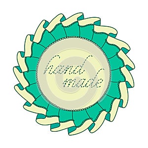 Cute circle frame with textile ruffles, ribbon, lace, thread and interrupted embroidery inscription `hand made`