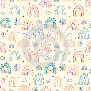 Cute colorful hand drawn rainbow, heart and natural elements seamless pattern background.