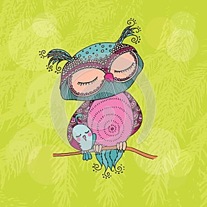 Cute colorful owl and little bird sitting on tree branch