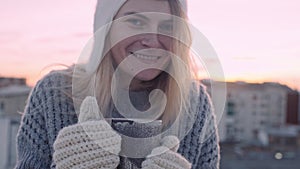 Cute cosy winter shot of woman with cup