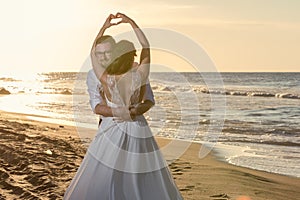 Lovely couples in the beach photo