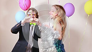 Cute couple dancing in photo booth