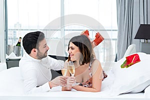 Cute couple on honeymoon in hotel.