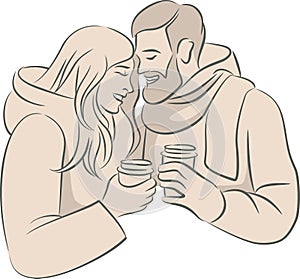 Cute couple in love in warm clothes olding paper cups with hot coffee or mulled wine in their hands