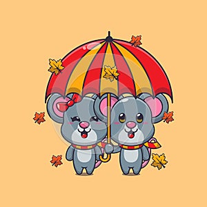 Cute couple mouse with umbrella at autumn season.