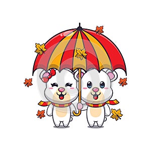 Cute couple polar bear with umbrella at autumn season.