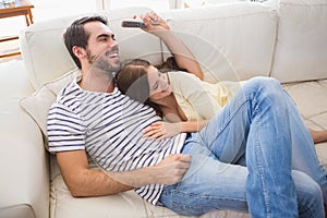 Cute couple relaxing on couch