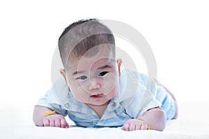 Cute crawling baby. Adorable baby girl, on white background.