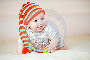 Cute crawling baby boy indoors