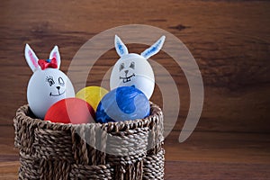 Cute creative photo with easter eggs, some eggs as the Easter Bunny