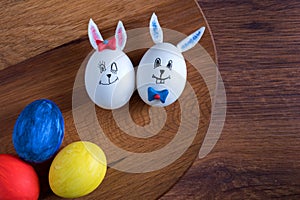 Cute creative photo with easter eggs, some eggs as the Easter Bunny