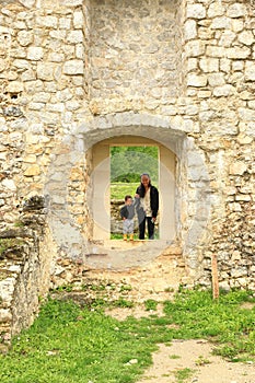 Cute curious boy with mom on old town Dreznik