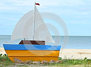 A cute cut out board in boat shaped by the children photo